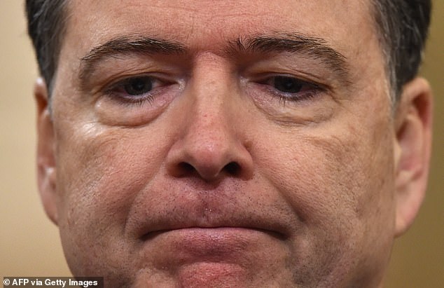 (FILES) FBI Director James Comey looks on during the House Permanent Select Committee on Intelligence hearing on Russian actions during the 2016 election campaign on March 20, 2017 on Capitol Hill in Washington, DC. Former FBI director James Comey, a prominent critic of US President Donald Trump, is to make his first court appearance on October 8, 2025, to face charges of making false statements and obstructing a congressional proceeding. Comey, 64, was indicted last month on two felony counts in an escalation of Trump's campaign of retribution against the Republican president's political foes. (Photo by Nicholas Kamm / AFP) (Photo by NICHOLAS KAMM/AFP via Getty Images)