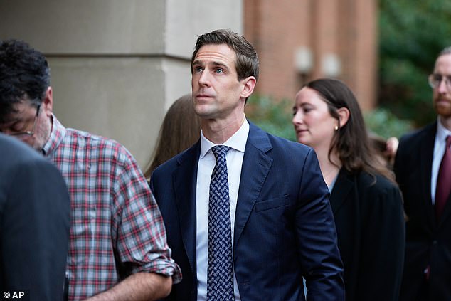 Troy Edwards, Jr., son-in-law of former FBI Director James Comey, arrives at federal court in Alexandria, Va., Wednesday, Oct. 8, 2025. (AP Photo/Alex Brandon)