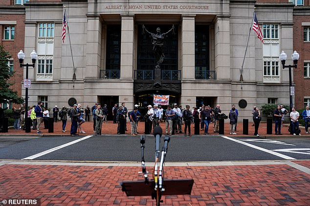 Members of the media wait outside the Albert V. Bryan United States Courthouse for the appearance of former FBI Director James Comey on the day he is expected to attend his arraignment on charges of making false statements and obstruction relating to his Senate Judiciary Committee testimony on September 30, 2020, in Alexandria, Virginia, U.S., October 8, 2025. REUTERS/Kent Nishimura