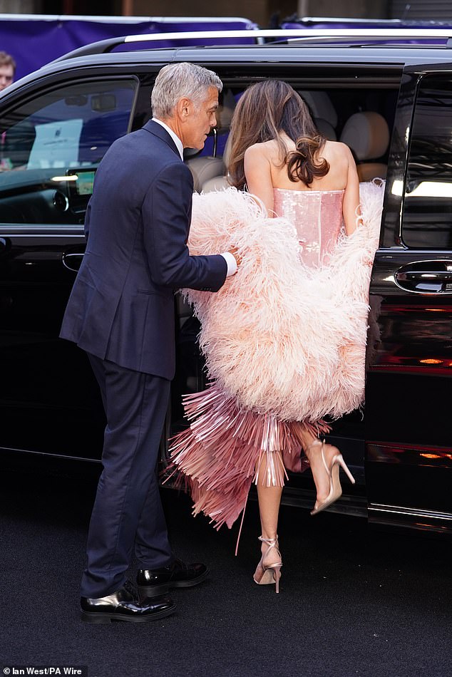 He helped Amal gracefully exit the car