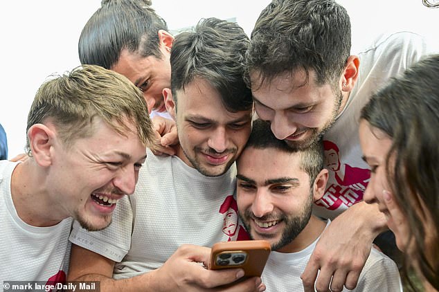 Friends piled in, desperate to catch the first glimpse of the 24-year-old alive since an image of him being forcibly starved and made to dig his own grave horrified the world in August