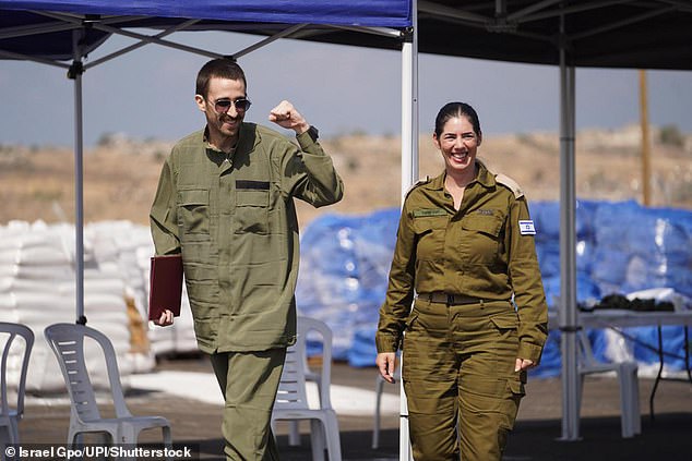 Returned hostage Avinatan Or with IDF representatives after his release from captivity on Monday, October 13, 2025, after spending more than two years in Hamas captivity