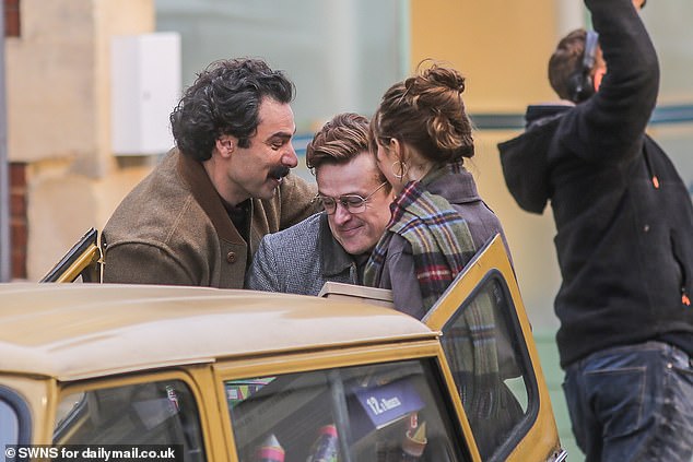 Jonny was seen helping with the fireworks which the trio loaded into Declan's mustard yellow Mini Clubman Estate