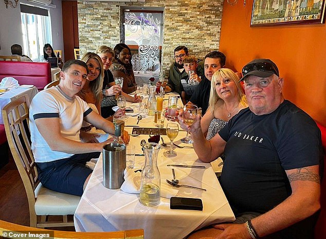 Lance, pictured with wife Sue next to him and his family, was described in tributes on social media as 'a true gentleman', 'one in a million', 'larger than life' and 'a legend'