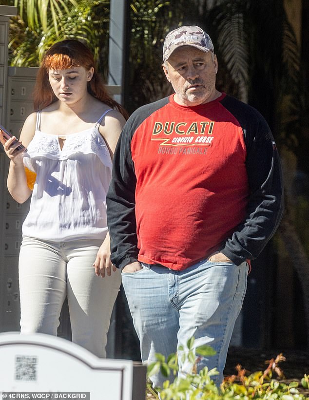 Le Blanc wore a red short, jeans and a baseball cap, and sported greying hair and a beard as he stepped out - marking the first time he has been seen publicly in 10 months