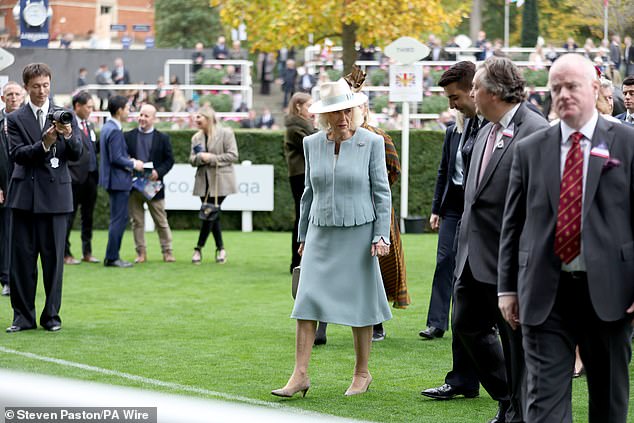 The Queen is pictured arriving at Ascot Racecourse in Berkshire on Saturday October 18
