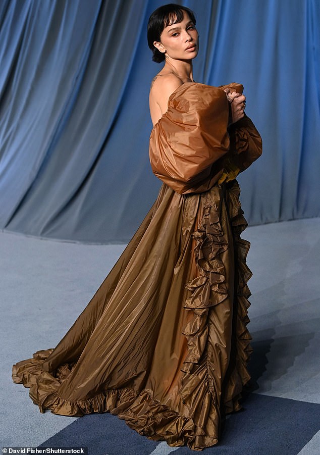 Zoe Kravitz donned a billowing brown gown with ruffled details as she attended the gala on Saturday