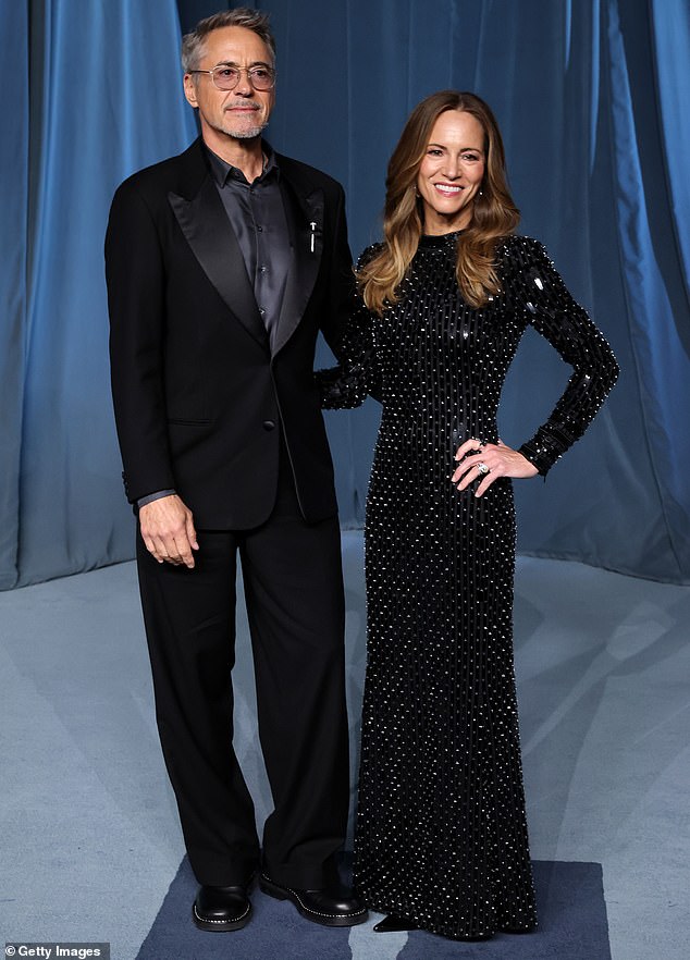 Robert Downey Jr. donned a stylish black suit alongside wife Susan who wowed in a sparkling black gown