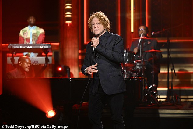 In 2000, Mick became embroiled in a lengthy dispute with record label Warner after they released the retrospective album It's Only Love against his wishes