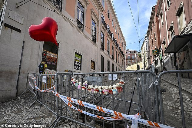 Flowers, balloons and candles were left by wellwishers close to the scene of the crash