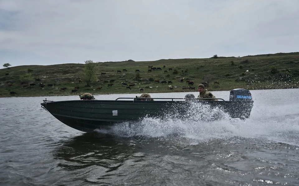 Ukrainian troops carry out regular reconnaissance missions across the Dnipro river and its banks
