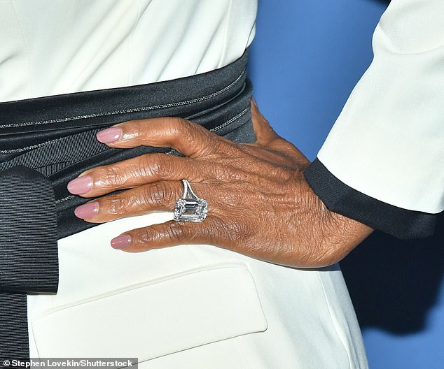 The TV personality sparkled up her look with a massive diamond ring on her finger, and dangling earrings