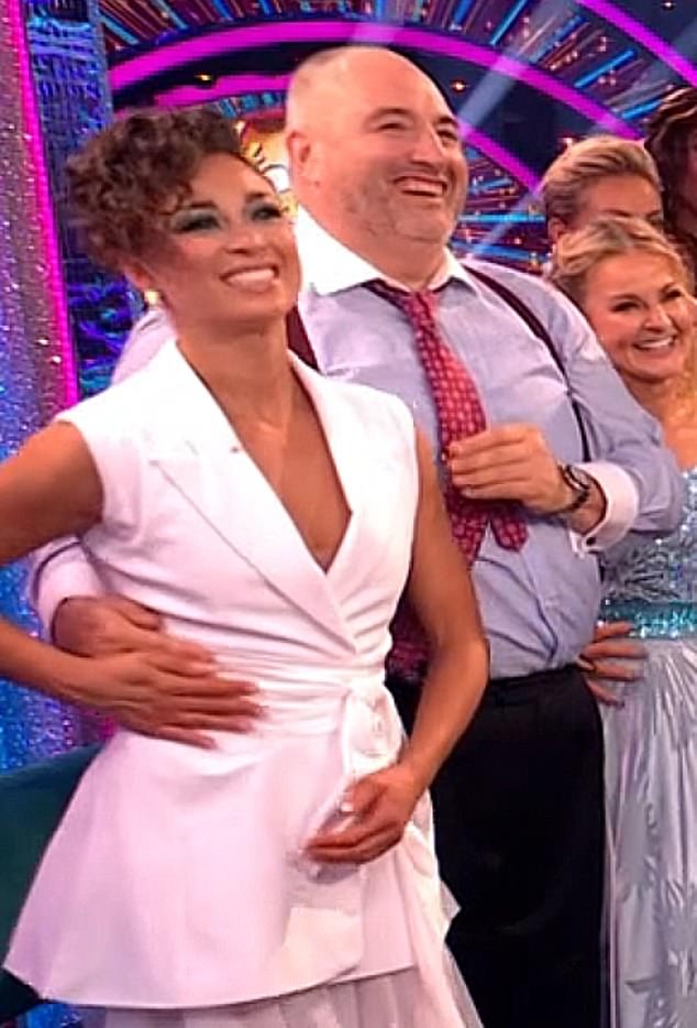 Wynne Evans and Katya Jones, who was seen moving his hand on live TV