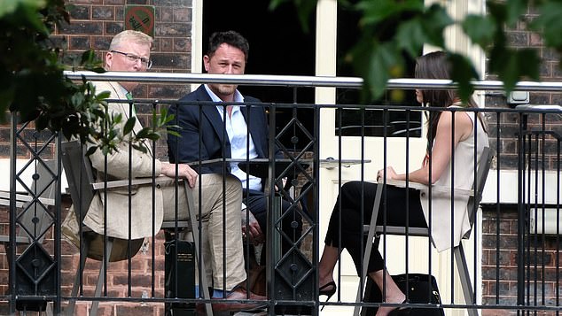 One of the few remaining on the team is Meredith Maines (pictured with  Royal Family's head of comms Tobyn Andreae at a secret meeting in July)