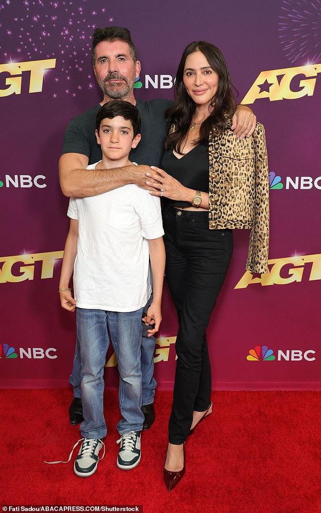 Simon popped the question to Lauren during a Barbados getaway in front of their son Eric, 11, and Lauren's son Adam, 19, in 2021 (Seen with Eric in 2024)