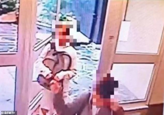 Lola is pictured in this CCTV footage still wearing a white coat and carrying what appears to be her schoolbag following Benkired into an apartment building