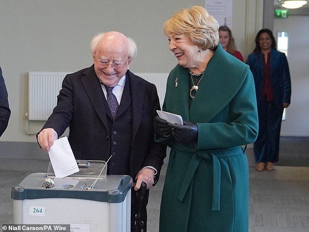 Current Irish President Michael D Higgins and his wife Sabina cast their votes in the election on Friday