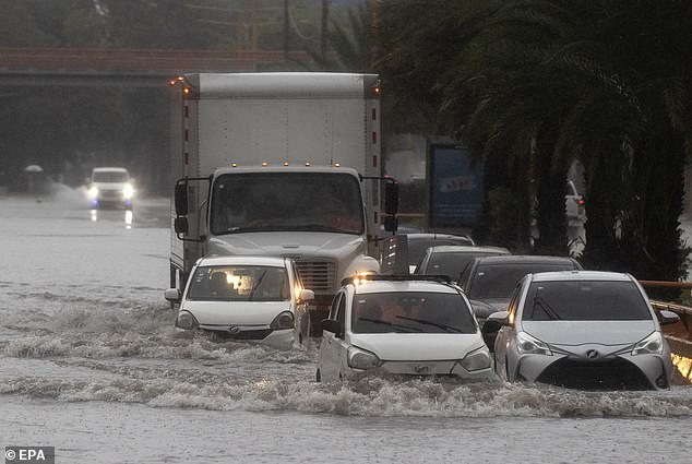 The storm has already dropped heavy rain in the Dominican Republic, pictured
