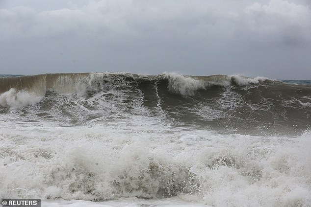 A wave crashes, as Hurricane Melissa approaches, in the Harbour View neighbourhood of Kingston, Jamaica, October 27, 2025