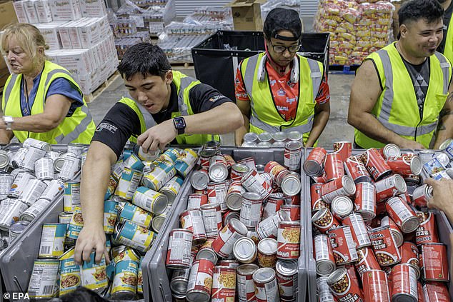 epa12488002 Volunteers fill up boxes with essential goods at the Global Empowerment Mission (GEM) headquarters in Doral, Miami, Florida, USA, 28 October 2025. The US-based nonprofit humanitarian organization, GEM, which specializes in providing rapid disaster relief and long-term recovery support to communities globally affected by natural disasters, conflicts, or crises, is mobilizing a major aid operation both ahead of and following the passage of Hurricane Melissa, a category 5 storm with maximum sustained winds up to 185 mph, that is expected to make landfall on Jamaica's coast on 28 October, according to the National Oceanic and Atmospheric Administration (NOAA).  EPA/CRISTOBAL HERRERA-ULASHKEVICH
