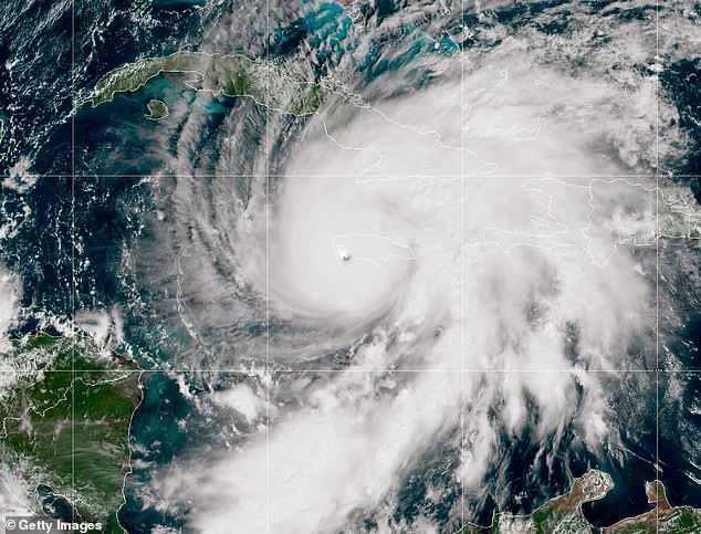 IN SPACE, CARIBBEAN SEA - OCTOBER 28: (EDITOR'S NOTE: This Handout image was provided by a third-party organization and may not adhere to Getty Images' editorial policy.) In this handout satellite image provided by the National Oceanic and Atmospheric Administration (NOAA), Hurricane Melissa churns through the Caribbean Sea, captured at 15:20Z on October 28, 2025. Hurricane Melissa has intensified into a Category 5 storm as it approaches Jamaica, bringing torrential winds and rain, according to the National Hurricane Center. (Photo by NOAA via Getty Images)