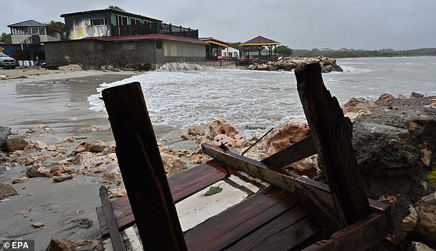 epa12486752 Fishing boats sit on the shore at Port Henderson beach, Portmore, Jamaica, 27 October 2025. Jamaican Prime Minister Andrew Holness said the government has a multifaceted plan to ensure a 'swift and effective' response to the imminent impact of Hurricane Melissa expected on Monday night, threatening to be the island's strongest recorded storm.  EPA/RUDOLPH BROWN