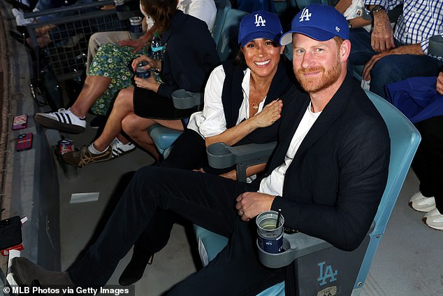 Harry and Meghan wore Dodgers caps for the occasion, which left many viewers perplexed