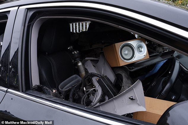Household goods, including a speaker system, stuffed inside one of the stolen cars being shipped to a country in Africa