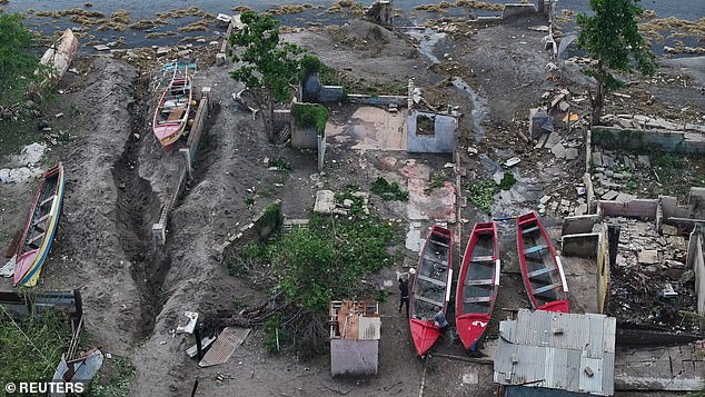 Drone view of damage structures and boats after Hurricane Melissa made landfall, in Alligator Pond, Jamaica, October 29, 2025. REUTERS/Maria Alejandra Cardona