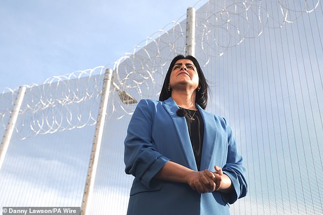 Since the scheme began more than 38,000 prisoners have been freed early by Labour, with monthly numbers on the rise. Pictured:Shabana Mahmood visits HMP Millsike near York earlier this year when she was Justice Secretary
