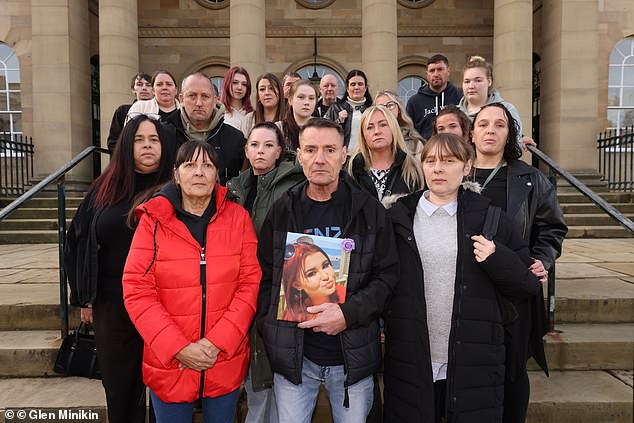 Mr Bedford stands with supporters and relatives of Leah at York Crown Court