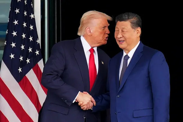 U.S. President Donald Trump and Chinese President Xi Jinping shake hands as they depart following a bilateral meeting at Gimhae Air Base on Oct. 30, 2025, in Busan, South Korea.