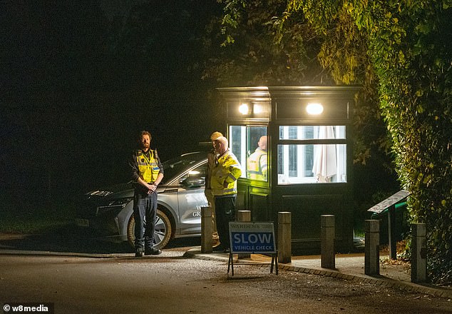 Security stand at the gates of the Royal Lodge following Thursday's announcement