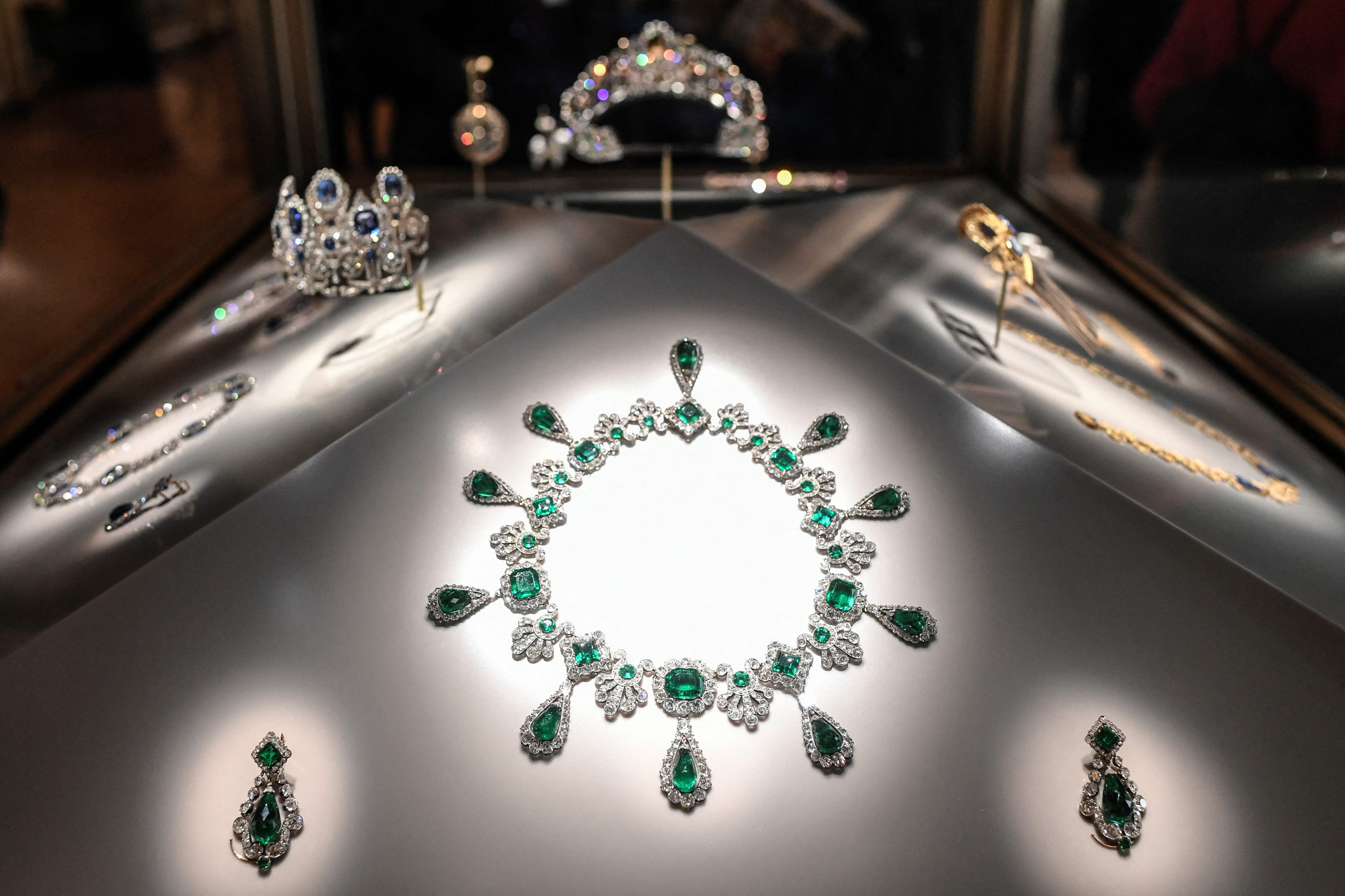 File photo of "Collier et boucles d'oreilles de la parure d'meraudes de l'imp'ratrice Marie-Louise" (necklace and earrings of the set of jewelry of Empress Marie-Louise) displayed at Apollon's Gallery on January 14, 2020 at the Louvre museum in Paris. (AFP)