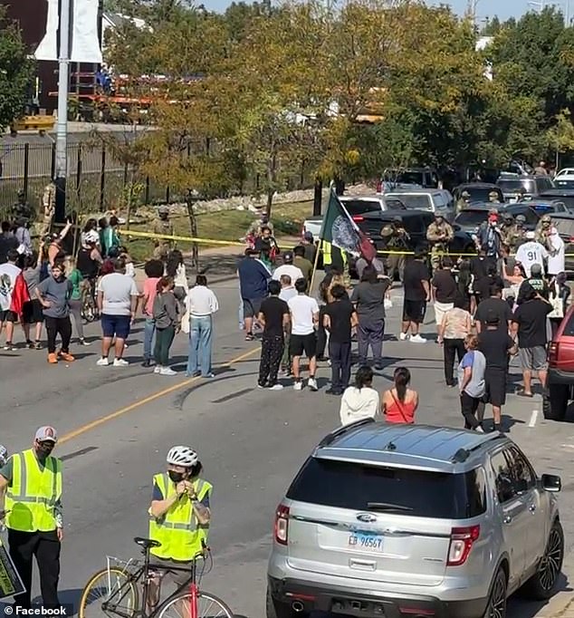 Authorities were on patrol in the Windy City's South Side near 39th and Kedzie on Saturday when officials said they were 'rammed by ten cars. Scene shot from today above