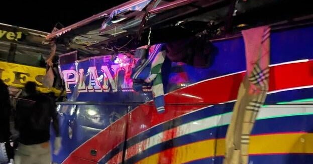 At least 63 killed as 2 buses hit head-on in At least 63 killed as 2 buses hit head-on in multi-vehicle crash in Uganda, police say