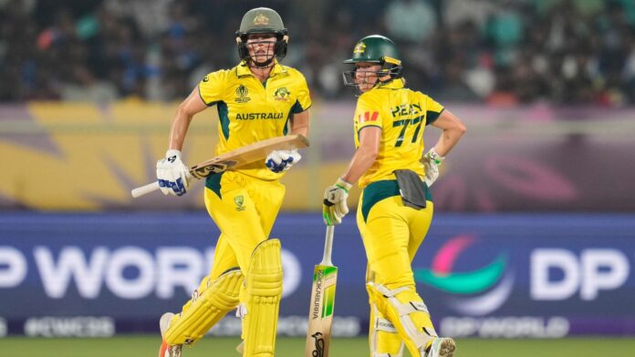 Australia's record-breaking win stuns India in 2025 World Cup; Here's Australia's captain Alyssa Healy, right, and batting partner Ellyse Perry run between the wickets to score during the ICC Women's Cricket World Cup match between India and Australia at ACA-VDCA Cricket Stadium in Visakhapatnam, India,