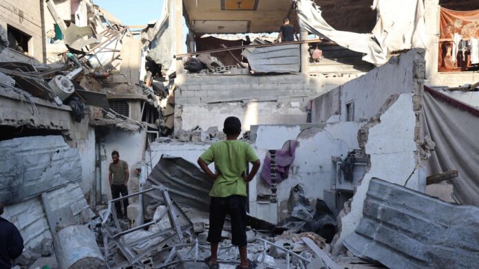 Palestinians inspect the damage around their homes after an Israeli strike. Image for representational purposes.