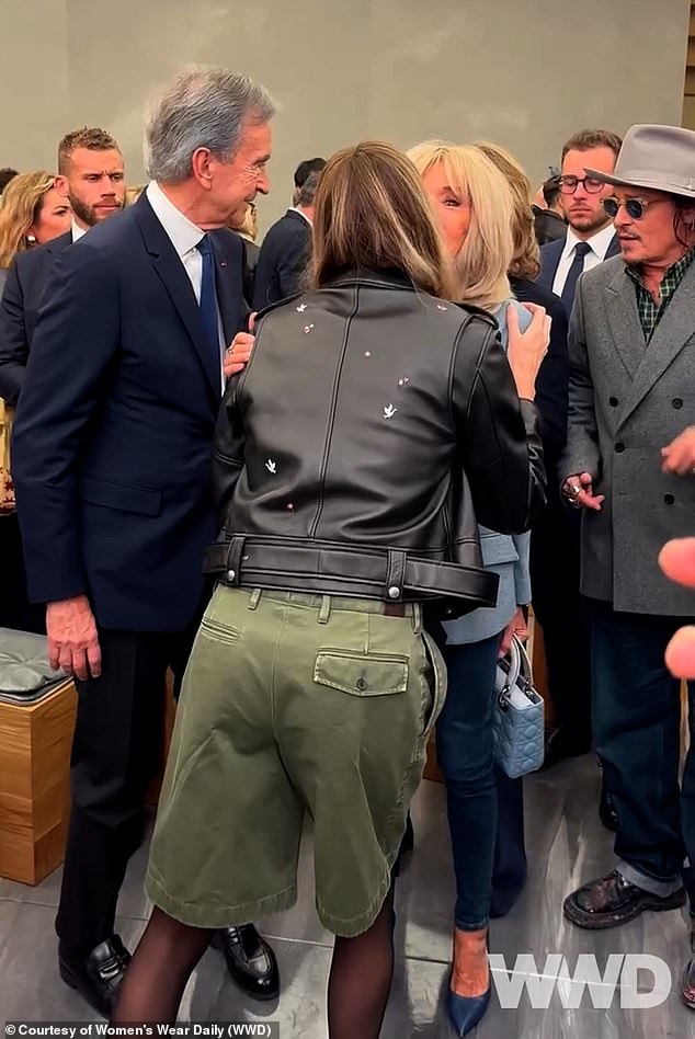 Charlize Theron ignores former co-star Johnny Depp while greeting Bernard Charlize Theron ignored former co-star Johnny Depp while greeting Bernard Arnault and Brigitte Macron on Wednesday as she shuns his 'slow return to the spotlight' at Dior PFW