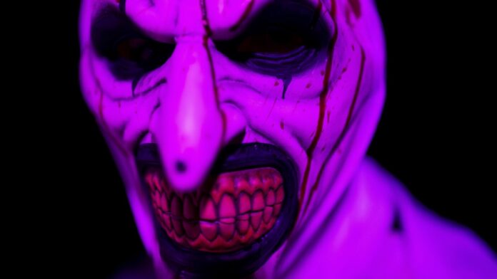 Halloween 2025: History, traditions, and why it's not a federal A reveler dressed in a costume poses during a Halloween celebration in Vilnius, Lithuanian, Sunday, Oct. 26, 2025. (AP Photo/Mindaugas Kulbis)