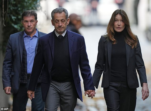 Humbled Nicolas Sarkozy and distraught-looking Carla Bruni leave their home Former French President Nicolas Sarkozy and his wife Carla Bruni-Sarkozy leave their Paris home on Tuesday as Nicolas Sarkozy heads to prison to serve time for a criminal conspiracy to finance his 2007 election campaign with funds from Libya