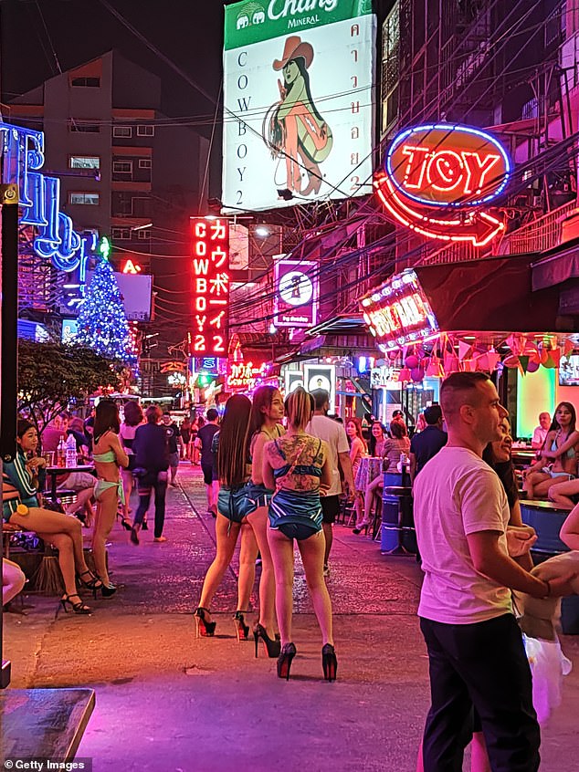 One of the travelers Mangione befriended on his trip told the New York Times that he was 'beaten up by seven ladyboys' (Pictured: The Soi Cowboy in Thailand)