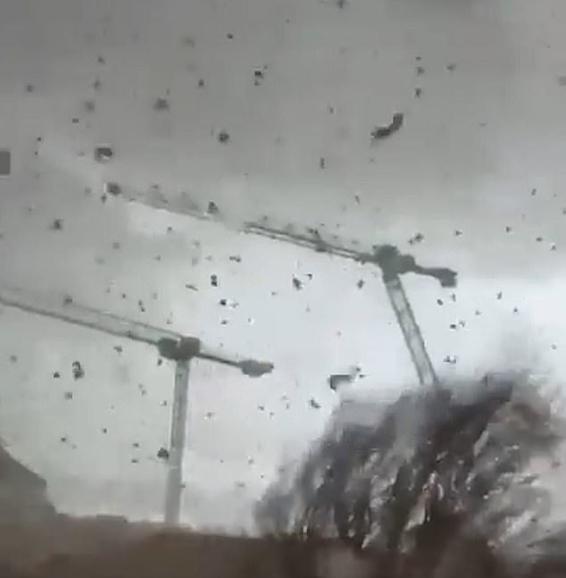 One person is dead and four others are fighting for The freak weather event hit the region of Ermont in Val d'Oise causing three cranes to come crashing down
