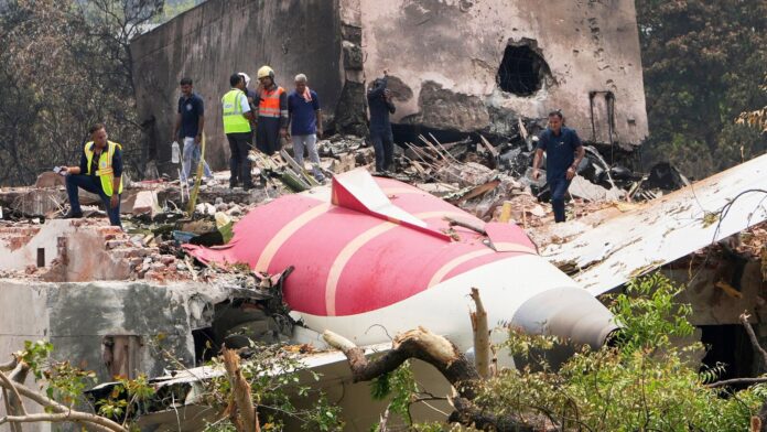 Pak airspace closure causing Air India ₹4000-cr damage, says CEO FILE - Officials inspect the site of Air India plane crash on the roof of a building in Ahmedabad, India, June 13, 2025. (AP Photo/Ajit Solanki, File)