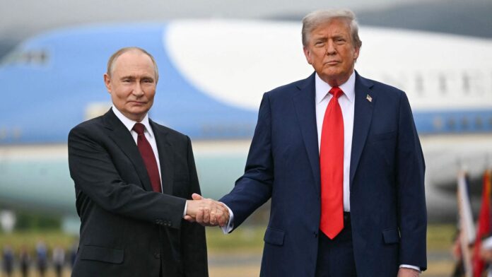 Putin cautions Trump against arming Ukraine with Tomahawks, calls move US President Donald Trump greets Russian President Vladimir Putin on the tarmac after they arrived at Joint Base Elmendorf-Richardson in Anchorage, Alaska, on August 15, 2025. (Photo by ANDREW CABALLERO-REYNOLDS / AFP)