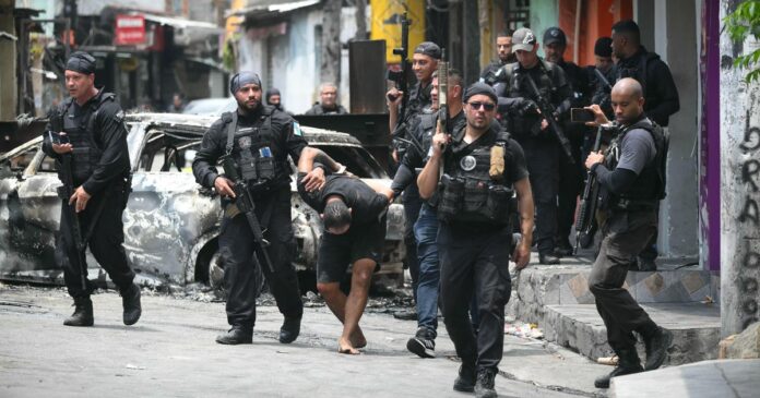 Raid on gang in Rio de Janeiro leaves at least Raid on gang in Rio de Janeiro leaves at least 64 people dead, including police officers