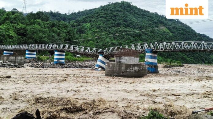 Rhinos have drowned, roads are now rivers: Rain fury ravages A portion of the Dudhia iron bridge collapsed due to heavy rain, in Darjeeling.