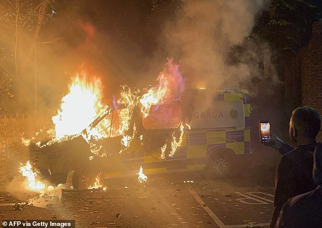 Protesters have charged police with horse-drawn carts and three Gardaí have been hospitalised