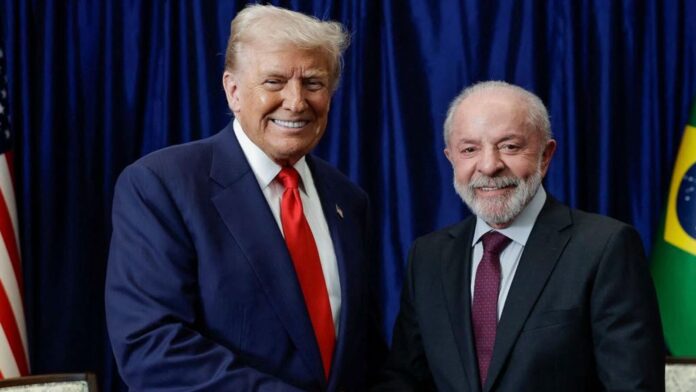 US-Brazil trade tensions: Lula after meeting Trump at ASEAN summit This handout picture released by the Brazilian Presidency shows Brazil's President Luiz Inacio Lula da Silva (R) shaking hands with US President Donald Trump during a bilateral meeting on the sidelines of the 47th Association of Southeast Asian Nations (ASEAN) Summit in Kuala Lumpur on October 26, 2025. (Photo by Ricardo STUCKERT / Brazilian Presidency / AFP)