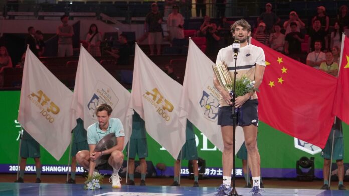 Valentin Vacherot wins Shanghai Masters; becomes lowest-ranked tournament winner in Winner Valentin Vacherot of Monaco, right, with Arthur Rinderknech of France, on the winners podium during the presentation ceremony for the Shanghai Masters tennis tournament at Qizhong Forest Sports City Tennis Center, in Shanghai, China, Sunday, Oct. 12, 2025. (AP Photo/Andy Wong)